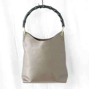 Gucci bamboo handle shoulder bag curved bamboo top handle